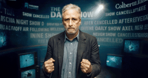 Jon Stewart slams Colbert cancellation, calling it corporate self-censorship cloaked as financial necessity.