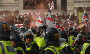 Tommy Robinson’s rally drew 150,000, sparking clashes, counter-protests, and debates on immigration, identity.