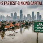 Flooded Jakarta neighborhood with boats and palm trees, city skyline in the distance; a sign reads 'Jakarta — Sinking City — Act now, or it’s too late.'