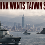 Bold headline reads 'WHY CHINA WANTS TAIWAN SO BADLY' over a naval scene with gray warships near a rocky island and a city skyline in the background, suggesting geopolitical tension.