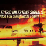 Poster-style banner with a parked jet and a fiery, orange-yellow background; headline reads: 'HYBRID ELECTRIC MILESTONE SIGNALS A NEW PHASE FOR COMMERCIAL FLIGHT'