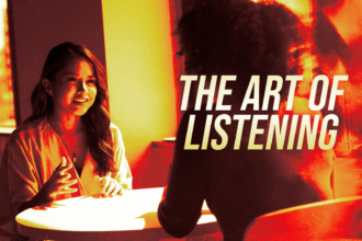 Promotional banner featuring a woman speaking at a table, with bold text 'THE ART OF LISTENING' occupying the right side.